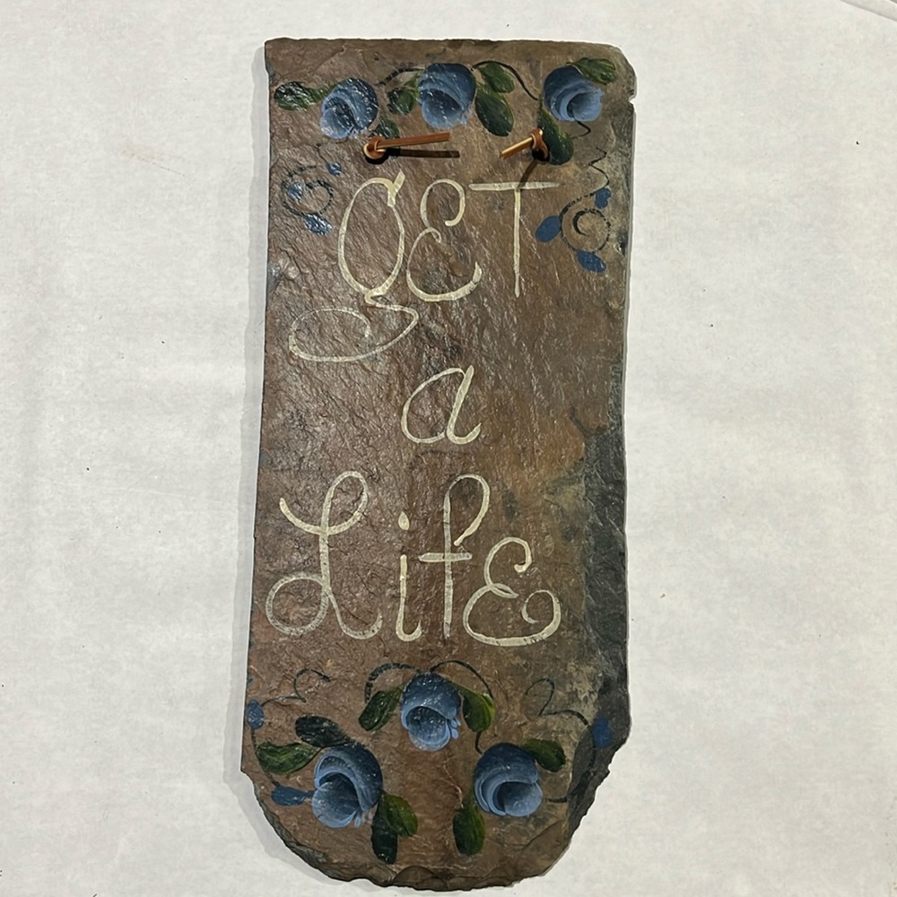 Handpainted slate sign. “Get a life”